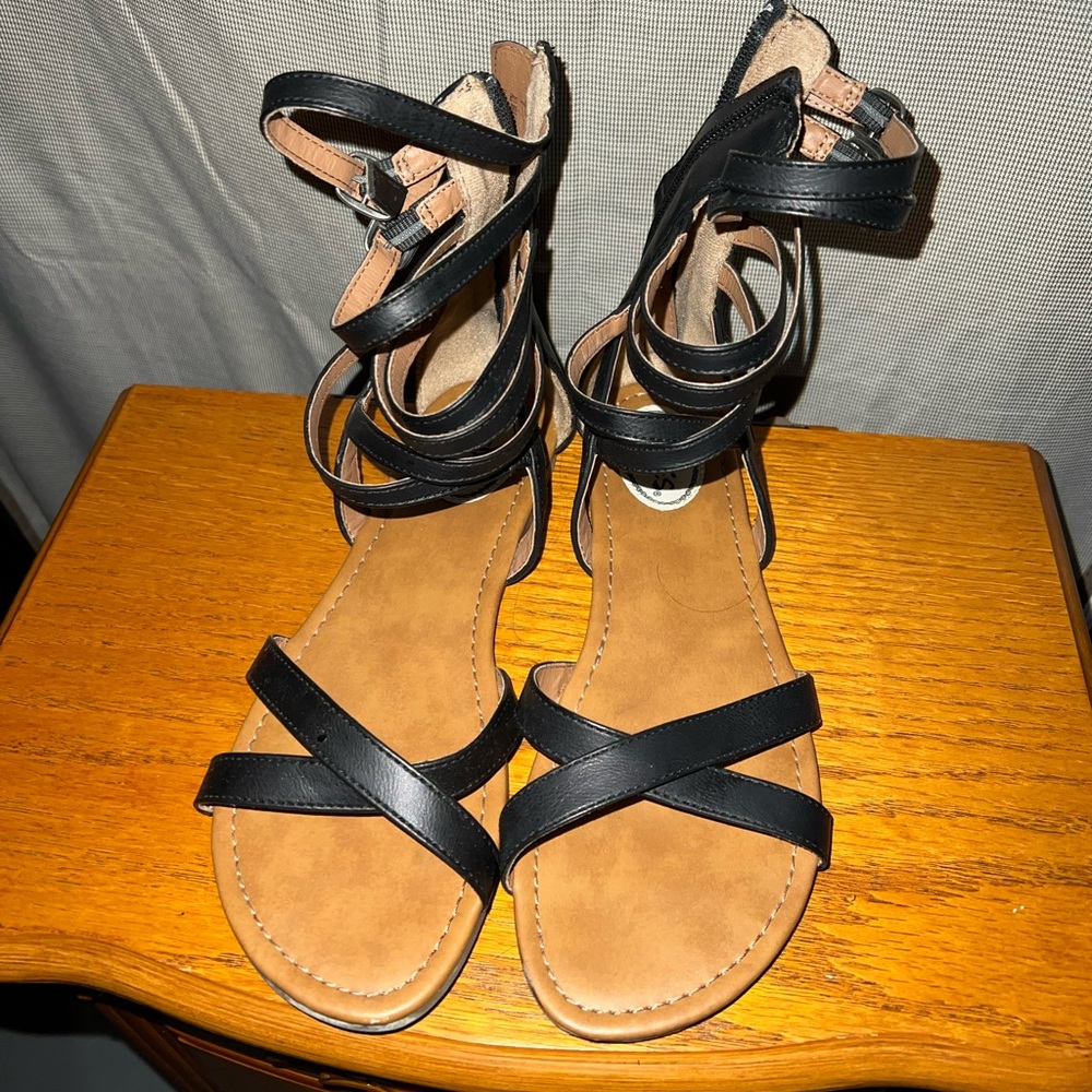 Stevie’s black sandals